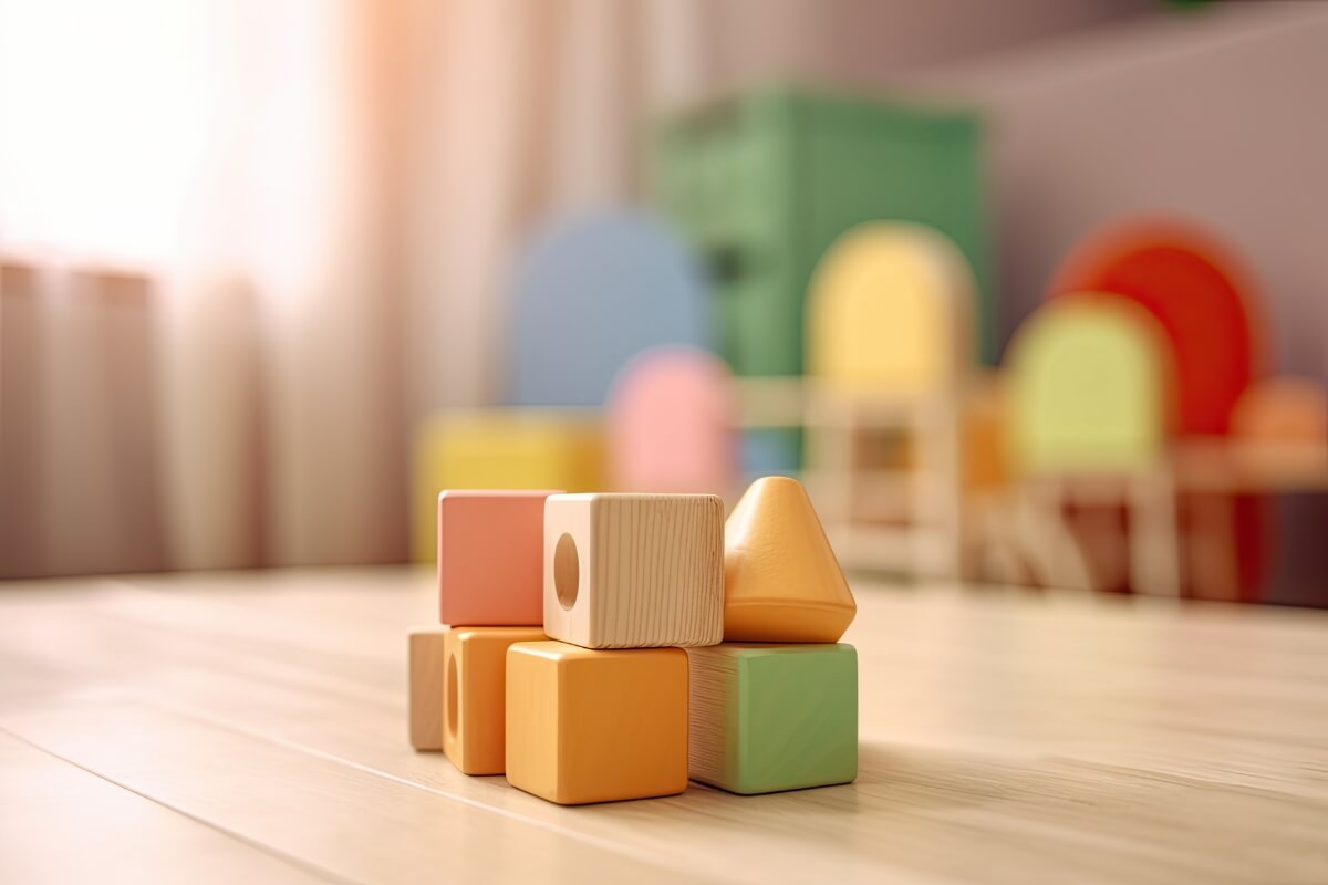Cute wooden Montessori toys in a playroom.