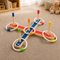 Dexterity Montessori game with rings, poles, and point beams.