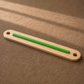 Balance Beam with a green pole in the middle. 