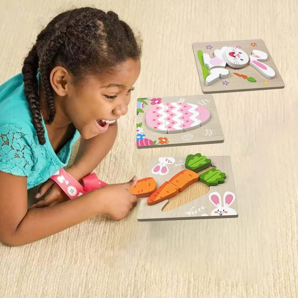 Little girl playing with Montessori Easter Wooden Puzzles. 