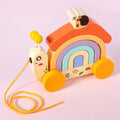 Colorful Montessori Pulling Snail toy with a rainbow. 