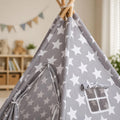 Close up on the fabric and wooden poles of the Montessori Teepee Tent.