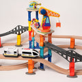 Montessori Crain and Train Magnetic Playset with wooden tracks, platforms, people, a helicopter, and a white futuristic train.