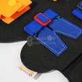 Blue buckle belt inside of the Montessori Dino Busy Board