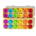 Montessori Geometric Eggs box open with all the egg halves showing shapes and colors inside.