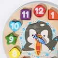 Close up of the Montessori Penguin's Clock 2.0 showing all the different shapes and numbers