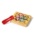 Colorful bee box toy with little bee pieces and red tweezers for children's educational play.