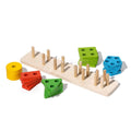 Wooden Building Blocks base with pillars, and colorful geometrical pieces around it.
