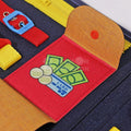 Close up of the wallet pocket inside of the Montessori felt busy board.