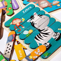 Closeup of zebra, monkey, and bee puzzle from the Montessori puzzle set.