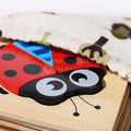 Ladybug wooden puzzle that's a part of the Montessori happy puzzles (6 pack) set.