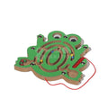 Montessori Magnetic Maze in the shape of a frog designed to increase children's hand-eye coordination.