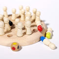 Close-up of Montessori Memory Match showing different sticks, disc and one dice.