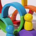 Closeup of the Montessori Rainbow pieces and figurines.