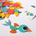 Close-up of the bird made of orange and blue pieces of the puzzle.