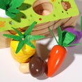 A pineapple, a carrot, and a mushroom with a Montessori Vegetable set.