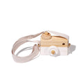 White Montessori Wooden Camera with a woven strap.