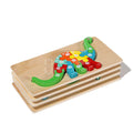 Montessori Wooden Puzzles (4 Pack) stacked on each other with the dino variant on the top.