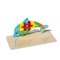 Montessori Wooden Puzzle in a shape of a dolphin.